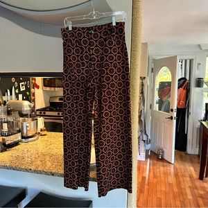 The Colette Cropped Wide-Leg Ponte Pants by Maeve in “Black Motif”